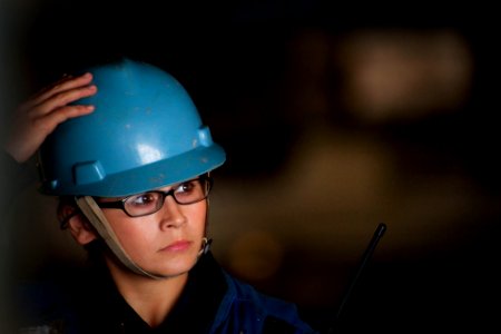 US Navy 100712-N-5319A-052 Boatswain's Mate 3rd Class Renee Cabrales waits in the well deck of the amphibious transport dock ship USS New Orleans (LPD 18)