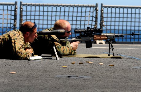 US Navy 100712-N-7948R-184 Marines practice firing their weapon aboard USS Pearl Harbor