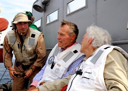 US Navy 100714-N-3885H-174 Former President George H.W. Bush watches flight operations aboard USS George H.W. Bush (CVN 77)