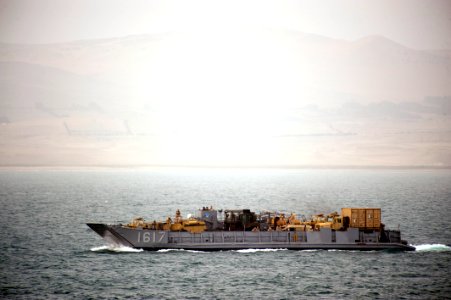 US Navy 100713-N-5319A-018 Landing Craft Utility (LCU) 1617 returns to the amphibious transport dock ship USS New Orleans (LPD 18) a