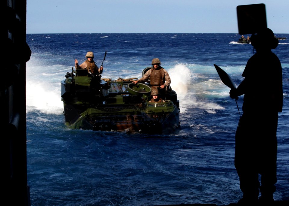 US Navy 100715-O-5633H-088 Soldiers assigned to Bravo Company, 2nd Battalion, Royal Australian Regiment approach the Royal Australian Navy amphibious transport ship HMAS Kanimbla (L 51)