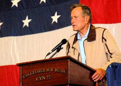 US Navy 100715-N-7908T-054 Former President George H.W. Bush speaks to the crew of the aircraft carrier USS George H.W. Bush (CVN 77) in the ship's hangar bay