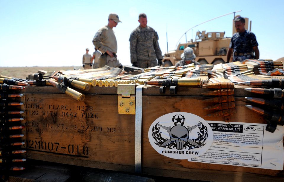 US Navy 100716-N-0879R-976 Sailors, along with members from the Iraqi National Police, prepare approximately 4,500 pounds of munitions for detonation