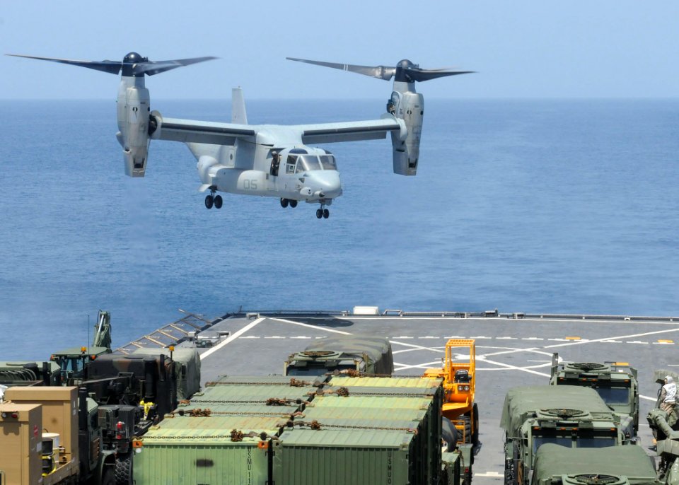 US Navy 100716-N-8069G-231 A Marine Corps V-22 Osprey prepares to land on the flight deck of USS Carter Hall (LSD 50)