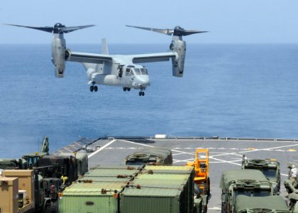 US Navy 100716-N-8069G-231 A Marine Corps V-22 Osprey prepares to land on the flight deck of USS Carter Hall (LSD 50)
