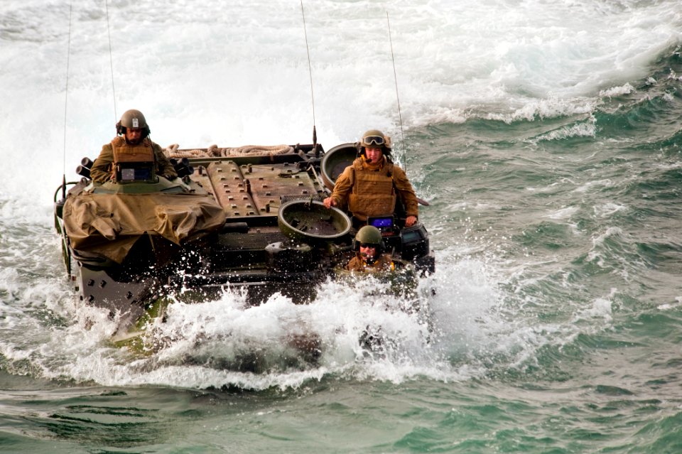 US Navy 100714-N-5319A-092 Marines assigned to Special Purpose Marine Air Ground Task Force 24, return from Salinas Beach, Peru in amphibious assault vehicles to the amphibious transport dock ship USS New Orleans (LPD 18) durin