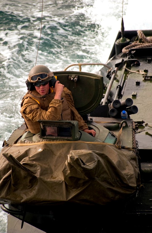 US Navy 100714-N-5319A-078 Sgt. Michael Splitt, assigned to Special Purpose Marine Air Ground Task Force 24, returns from Salinas Beach, Peru in an amphibious assault vehicle