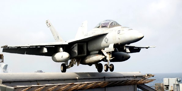 US Navy 100717-N-7317W-002 An F-A-18F Super Hornet assigned to the Swordsmen of Strike Fighter Squadron (VFA) 32 launches from the aircraft carrier USS Harry S. Truman (CVN 75)