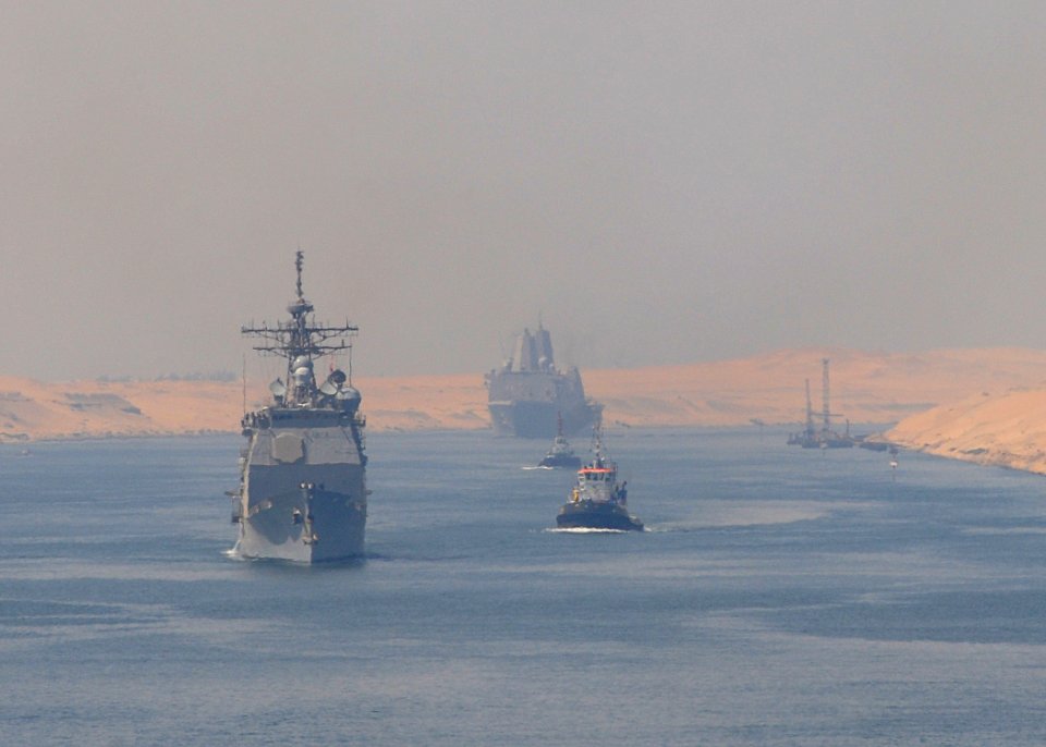 US Navy 100718-N-1082Z-016 The guided-missile cruiser USS San Jacinto (CG 56) transits the Suez Canal followed by the amphibious transport dock ship USS Mesa Verde (LPD 19)