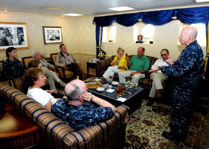 US Navy 100714-N-6632S-091 Capt. Chip Miller, commanding officer of the aircraft carrier USS George H.W. Bush (CVN 77), welcomes aboard former President George H.W. Bush and his wife, Barbara
