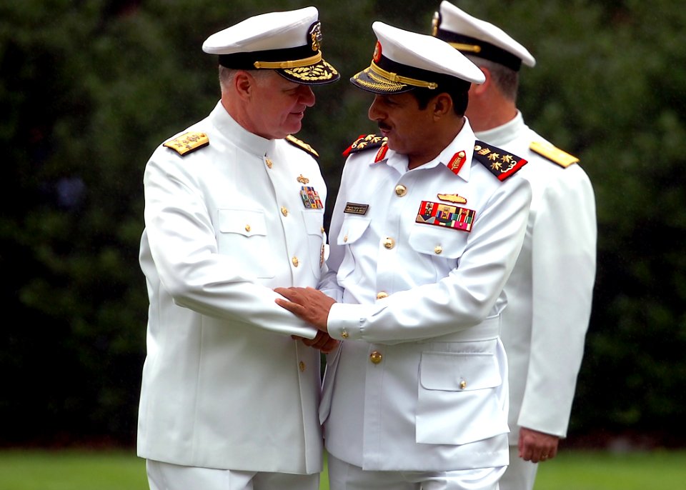 US Navy 100714-N-8132M-243 Chief of Naval Operations Adm. Gary Roughead speaks with Brig. Gen. Abdulla Saeed Al Mansoori during a full honors arrival ceremony at the Washington Navy Yard