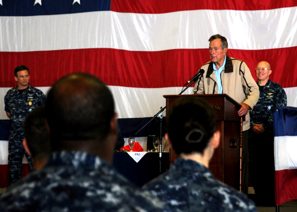 US Navy 100715-N-6509M-045 Former President George H.W. Bush speaks to officers and crew assigned to the aircraft carrier that bears his name, USS George H.W. Bush (CVN 77)