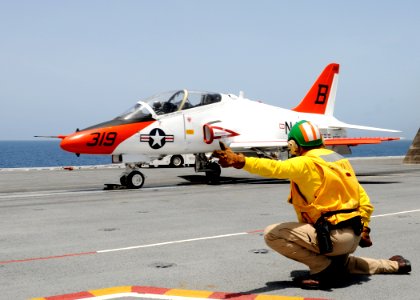 US Navy 100717-N-6632S-497 A shooter prepares to launch a T-45C Goshawk training aircraft from the aircraft carrier USS George H.W. Bush (CVN 77). George H.W. Bush is conducting training operations in the Atlantic Ocean