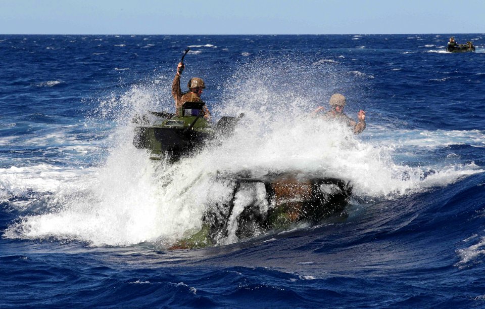 US Navy 100715-O-5633H-063 Soldiers assigned to Bravo Company, 2nd Battalion, Royal Australian Regiment approach the Royal Australian Navy amphibious transport ship HMAS Kanimbla (L 51)
