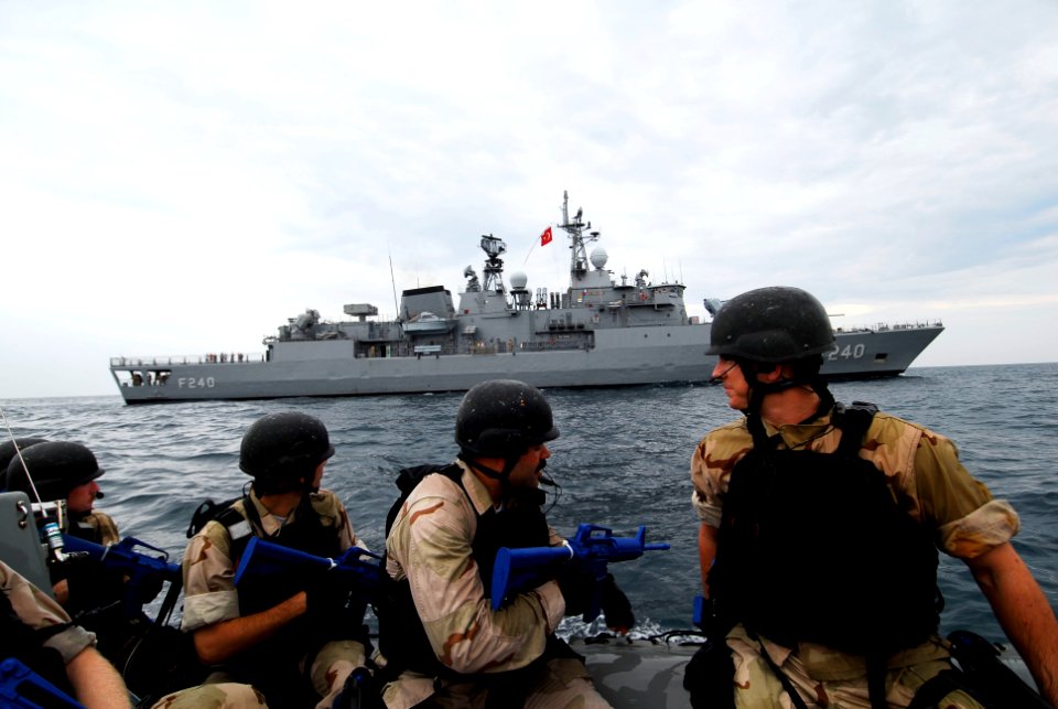 US Navy 100719-N-7638K-399 The visit, board, search and seizure team assigned to the guided-missile frigate USS Taylor (FFG 50) prepares to board the Turkish Navy frigate TCG Yavuz (F 240)