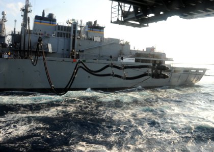 US Navy 100716-N-0569K-130 The aircraft carrier USS Enterprise (CVN 65) conducts an underway replenishment with the Military Sealift Command fast combat support ship USNS Arctic (T-AOE 8)