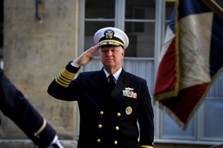 US Navy 100719-N-8273J-008 Chief of Naval Operations (CNO) Adm. Gary Roughead salutes during the playing of the U.S. national anthem during a welcoming ceremony at the French Navy Headquarters in Paris