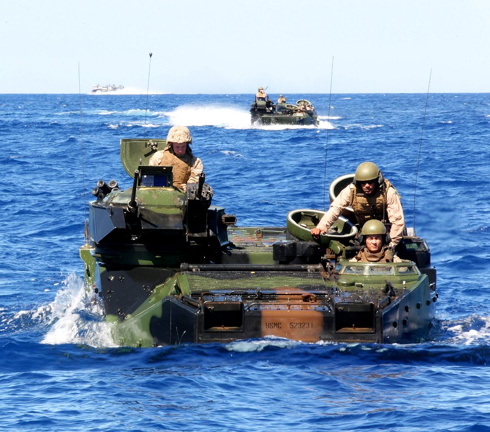US Navy 100715-O-5633H-026 Soldiers assigned to Bravo Company, 2nd Battalion, Royal Australian Regiment approach the Royal Australian Navy amphibious transport ship HMAS Kanimbla (L 51)
