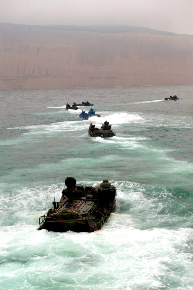 US Navy 100716-N-5319A-070 Marines assigned to Special Purpose Marine Air Ground Task Force (SPMAGTF) 24 transit to Salinas Beach, Peru in amphibious assault vehicles after disembarking the amphibious transport dock ship USS Ne