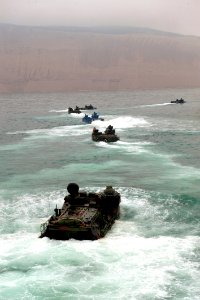 US Navy 100716-N-5319A-070 Marines assigned to Special Purpose Marine Air Ground Task Force (SPMAGTF) 24 transit to Salinas Beach, Peru in amphibious assault vehicles after disembarking the amphibious transport dock ship USS Ne