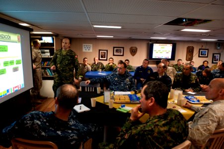US Navy 100717-N-5319A-006 A Peruvian marine lectures at a confirmation brief in the wardroom of USS New Orleans (LPD 18)