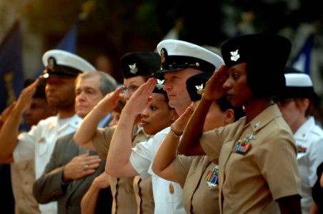 US Navy 100720-N-4930E-578 Master Chief Petty Officer of the Navy (MCPON) Rick West, second from right, joins the 2009 Sailors of the Year in saluting the American flag