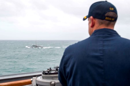 USN officer looks at the RFNS Kikau - 181017-N-VG727-2016