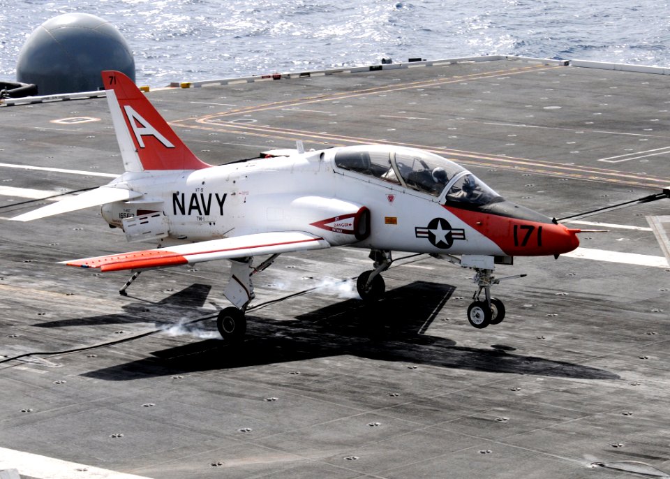 US Navy 100718-N-6632S-203 A T-45C Goshawk training aircraft assigned to Training Wing (TRAWING) 1 lands aboard the aircraft carrier USS George H.W. Bush (CVN 77)