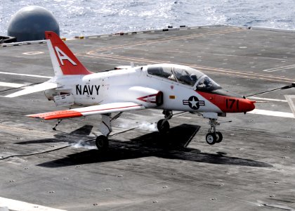 US Navy 100718-N-6632S-203 A T-45C Goshawk training aircraft assigned to Training Wing (TRAWING) 1 lands aboard the aircraft carrier USS George H.W. Bush (CVN 77)