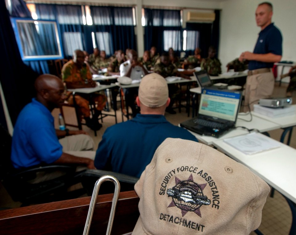 US Navy 100720-N-9589S-453 Instructors from the Maritime Civil Affairs and Security Training, Security Force Assistance (SFA) team, review anti-terrorism and force protection measures with members of the Cameroon navy at Douala
