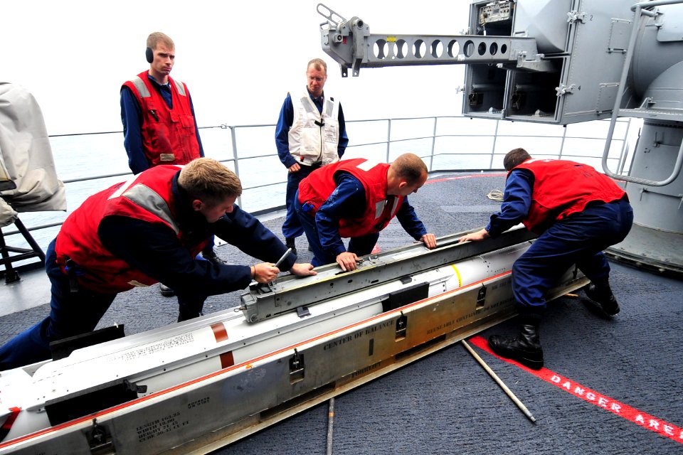 US Navy 100721-N-2953W-777 Sailors load an Evolved Sea Sparrow Surface Missile aboard USS Carl Vinson (CVN 70)