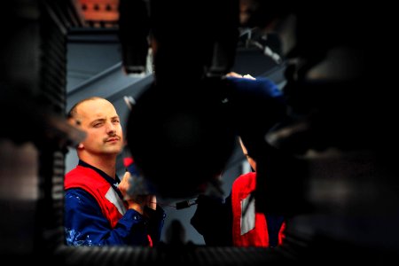 US Navy 100721-N-2953W-855 Fire Controlman 3rd Class Steven Bishop oads an Evolved Sea Sparrow Surface Missile aboard USS Carl Vinson (CVN 70)
