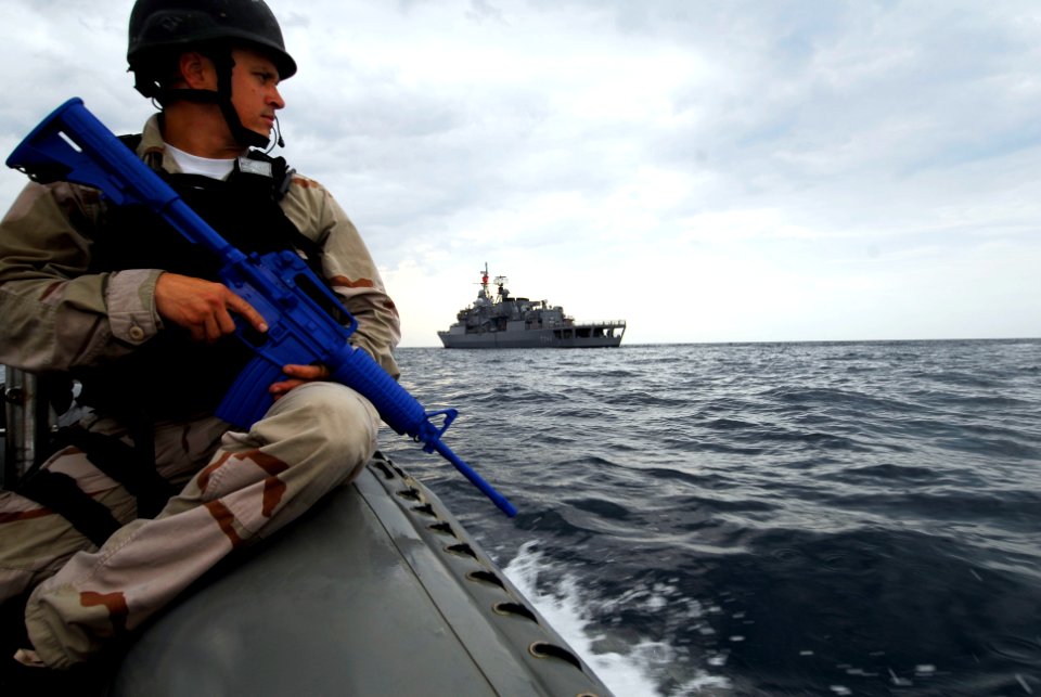 US Navy 100719-N-7638K-423 Fire Controlman 2nd Class Kevin McCarthy, from Daytona Beach, Fla., a visit, board, search and seizure team member assigned to the guided-missile frigate USS Taylor (FFG 50)