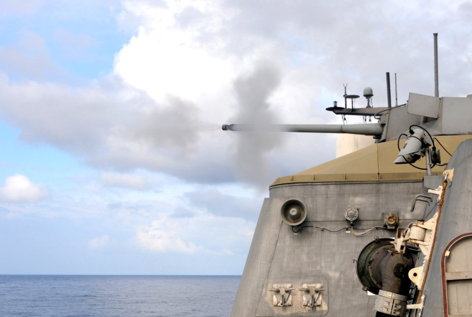 US Navy 100721-N-7058E-835 The littoral combat ship USS Freedom (LCS 1) fires one of its Mk-46 30mm chain guns during a live-fire exercise off the coast of Kauai, Hawaii