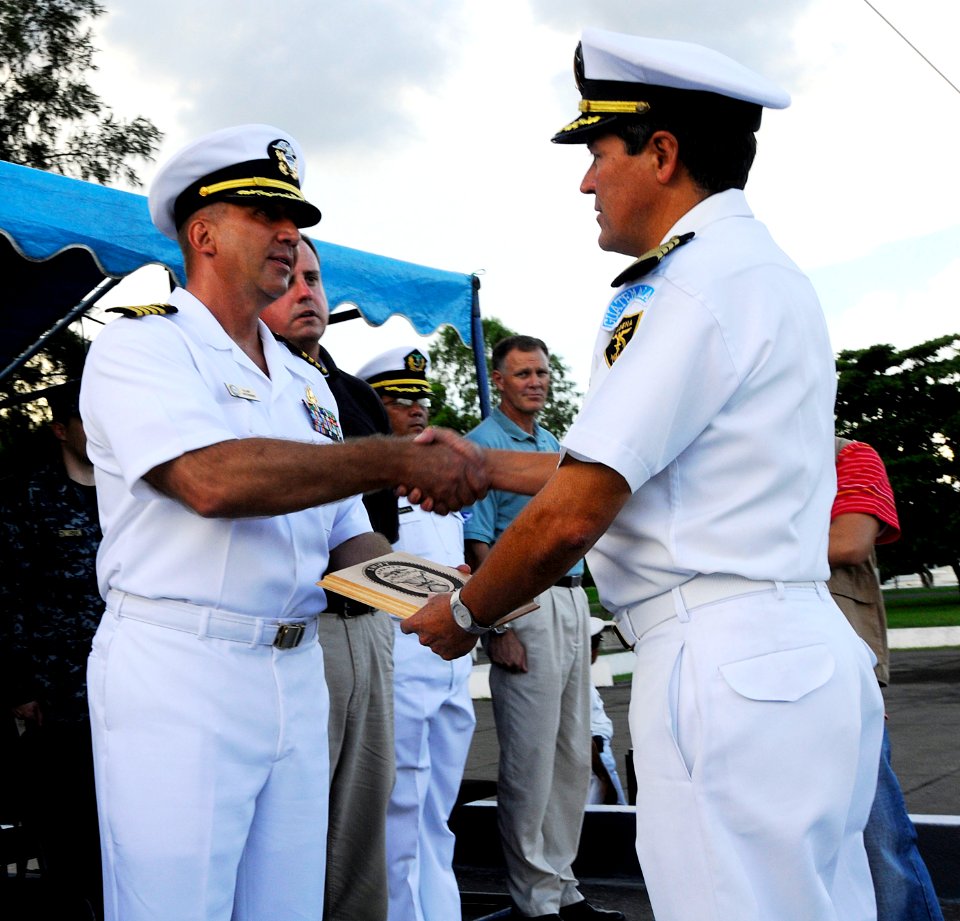 US Navy 100722-N-9643W-247 Capt. Kurt Hedberg ccepts a plaque from a member of the Guatemalan military for his role in SPS-2010 during the closing ceremony in Guatemala