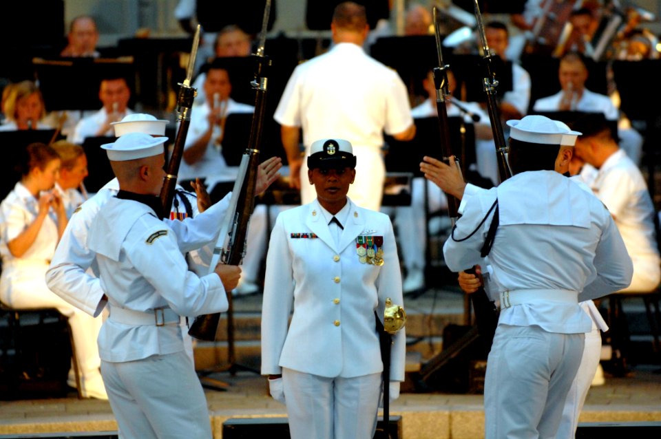 US Navy 100720-N-4930E-543 Members of the U.S. Navy Ceremonial Guard Drill Team perform at the Navy Memorial in Washington, D.C