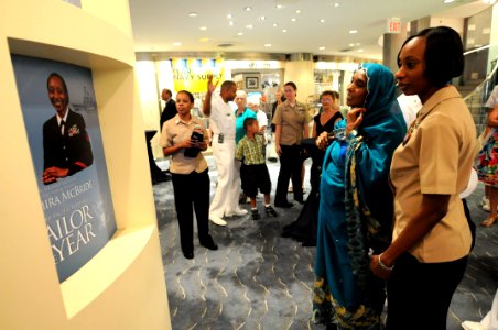 US Navy 100720-N-9818V-183 The 2009 U.S. Pacific Fleet Sea Sailor of the Year, Operations Specialist 1st Class Samira McBride, and her mother look at the new Sailor of the Year display at the Navy Memorial