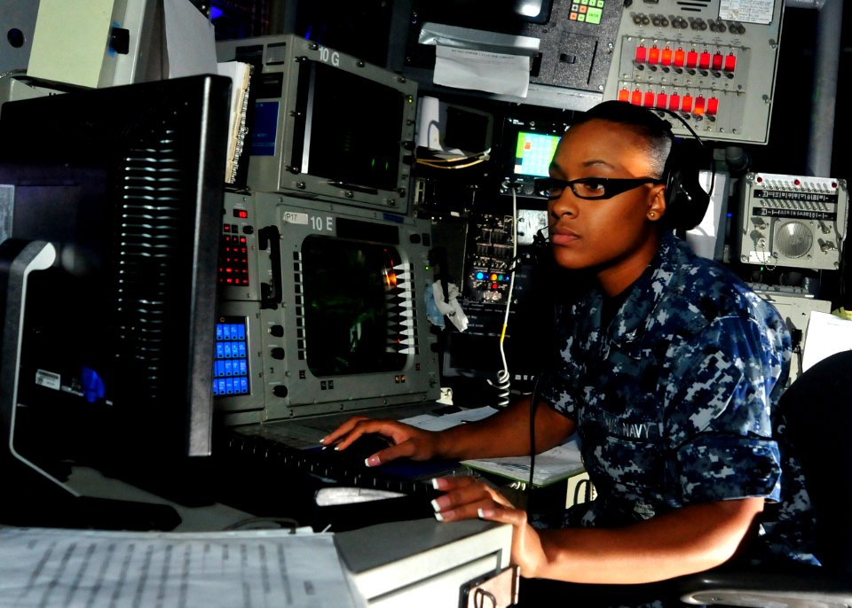 US Navy 100721-N-0569K-007 Operations Specialist 3rd Class LaShawn E. Sloan monitors a radar system aboard USS Enterprise (CVN 65)