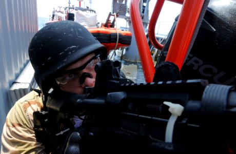 US Navy 100721-N-3154P-016 Operations Specialist Seaman Apprentice David Wolery, assigned to the amphibious transport dock ship USS Ponce (LPD 15),