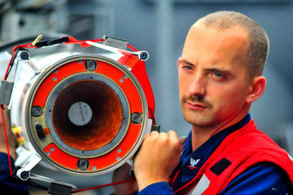 US Navy 100721-N-2953W-892 Fire Controlman 3rd Class Steven Bishop loads an Evolved Sea Sparrow Surface Missile aboard USS Carl Vinson (CVN 70)