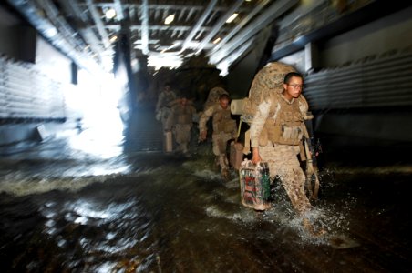 US Navy 100721-N-6477M-312 U.S. Marines from the 2nd Battalion, 3rd Marine Regiment disembark a Landing Craft Utility (LCU) in the well deck of the amphibious transport dock ship USS Cleveland (LPD 7)