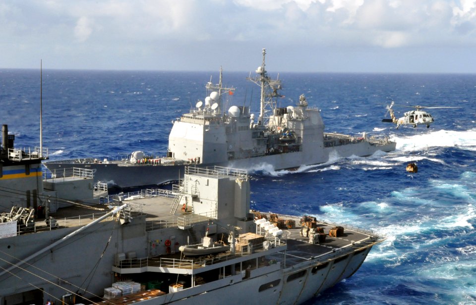 US Navy 100721-N-7042V-146 USS Chancellorsville (CG 62) pulls alongside USNS Bridge (T-AOE 10)