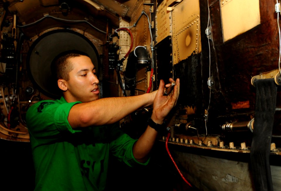 US Navy 100723-N-1092P-072 Cpl. Chris Stanislawski prepares to conduct a fire bottle extinguisher test on an F-A-18C Hornet