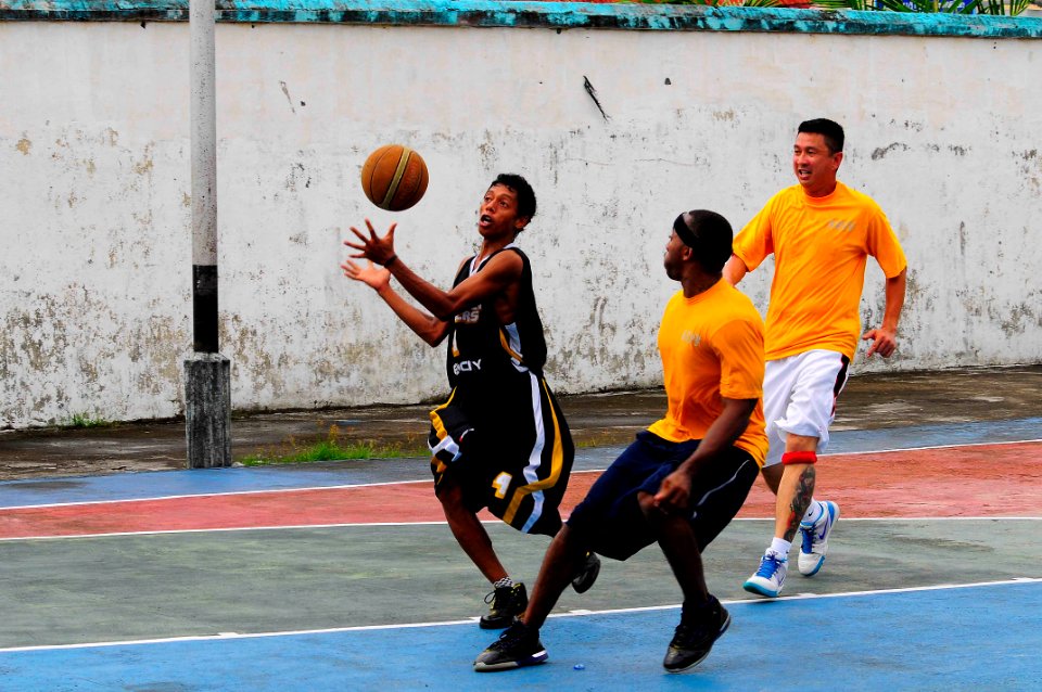 US Navy 100721-N-6410J-211 Players from Pangasila Ballers and USNS Mercy (T-AH 19) participate in a basketball game during a community service event in Ternate, Indonesia while supporting Pacific Partnership 2010