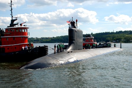 US Navy 100722-N-3090M-365 The Virginia-class submarine Pre-Commissioning Unit (PCU) Missouri (SSN 780) prepares to moor at Naval Submarine Base New London for the first time. Missouri will be commissioned at the base July 31 photo