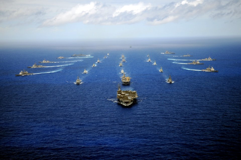 US Navy 100724-N-9500T-787 The Nimitz-class aircraft carrier USS Ronald Reagan (CVN 76) leads a mass formation of ships from Korea, Taiwan, Japan, Singapore, France, Canada, Australia and the U.S. during Rim of the Pacific (RIM