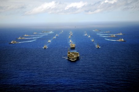 US Navy 100724-N-9500T-787 The Nimitz-class aircraft carrier USS Ronald Reagan (CVN 76) leads a mass formation of ships from Korea, Taiwan, Japan, Singapore, France, Canada, Australia and the U.S. during Rim of the Pacific (RIM