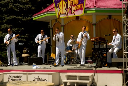 US Navy 100723-N-2389S-032 The U.S. Navy Rock Band Horizon performs at a theme park as part of Twin Cities Navy Week photo