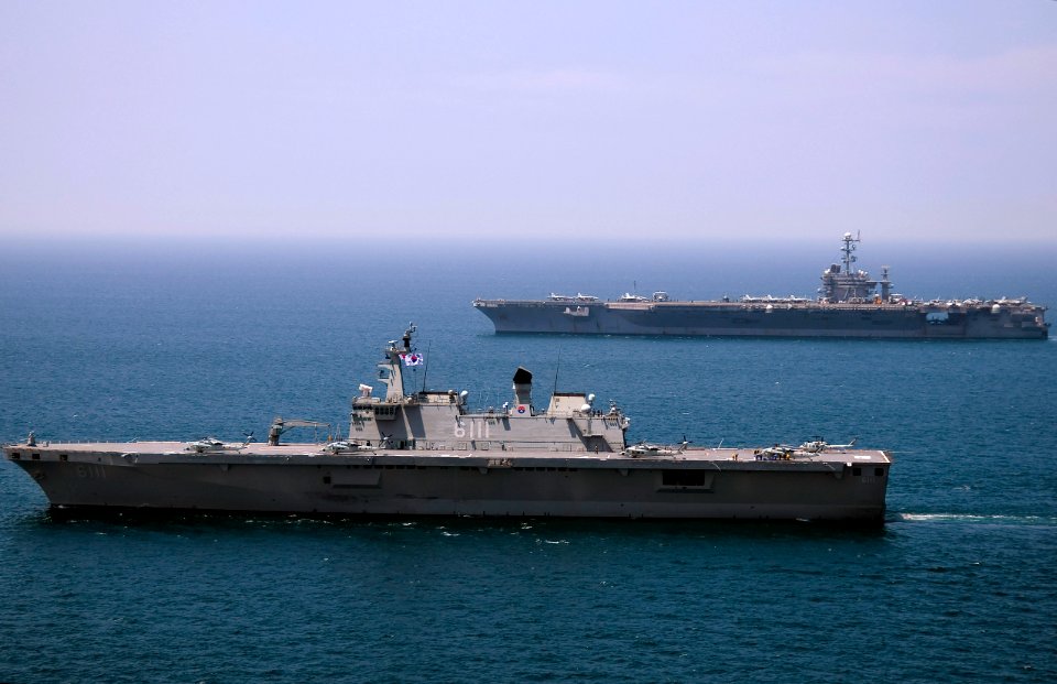 US Navy 100727-N-2013O-008 The Republic of Korea Navy amphibious landing ship ROKS Dokdo (LPH 6111) and the aircraft carrier USS George Washington (CVN 73) transit the Sea of Japan