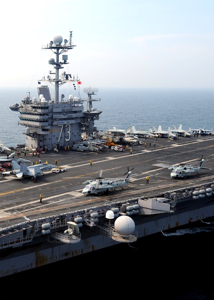 US Navy 100727-N-6720T-017 Two Republic of Korea SH-60S Sea Hawk helicopters land on the flight deck of USS George Washington (CVN 73)